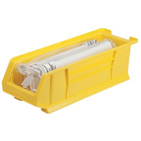 Yellow extra large plastic bin storing materials on a white background.