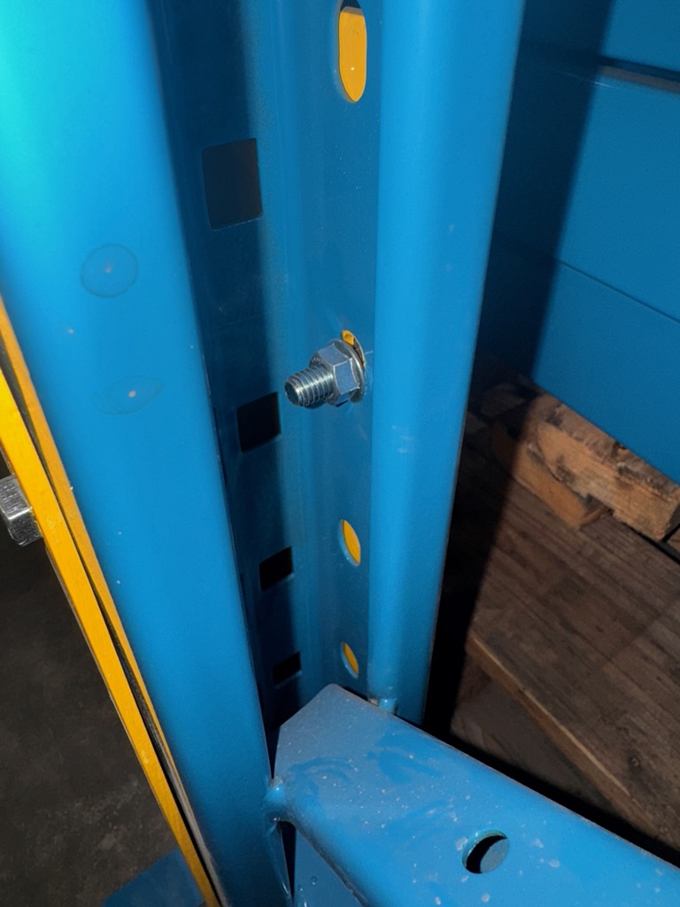 bolt that holds upright protector to racking
