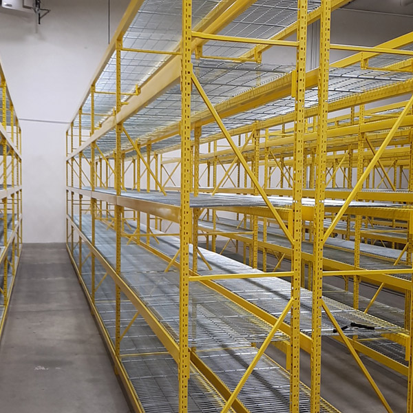 Wide span shelving in a warehouse setting.