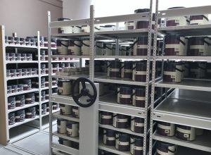 Manual mobile storage shelving system in retail setting