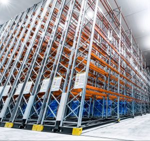 powered mobile racking system in warehouse racking