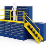 Computer generated image of a blue stack and store cabinet mezzanine with a person standing on the top level on a white background.