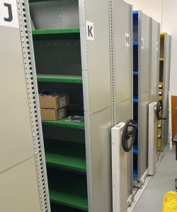 After photo featuring colour-coded mobile shelving system maximizing storage efficiency at SSA Marine facility.