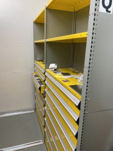 After photo featuring colour-coded mobile shelving system maximizing storage efficiency at SSA Marine facility in Squamish.