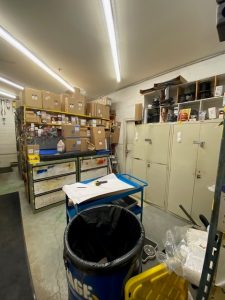 Before photo showing disorganized marine terminal tool storage with limited accessibility