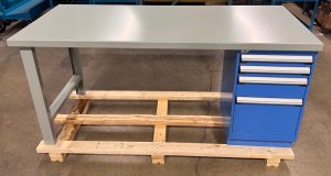 Grey workbench with blue drawers