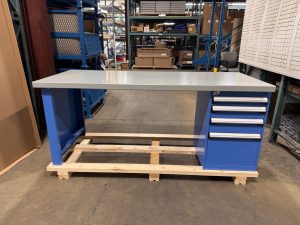 Grey workbench with blue drawers